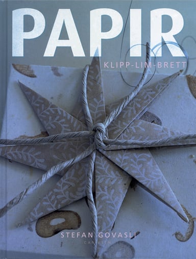Omslag av "Papir - klipp, lim og brett"