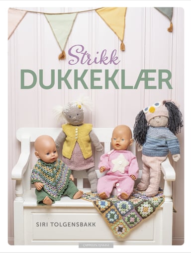 Omslag av "Strikk dukkeklær"